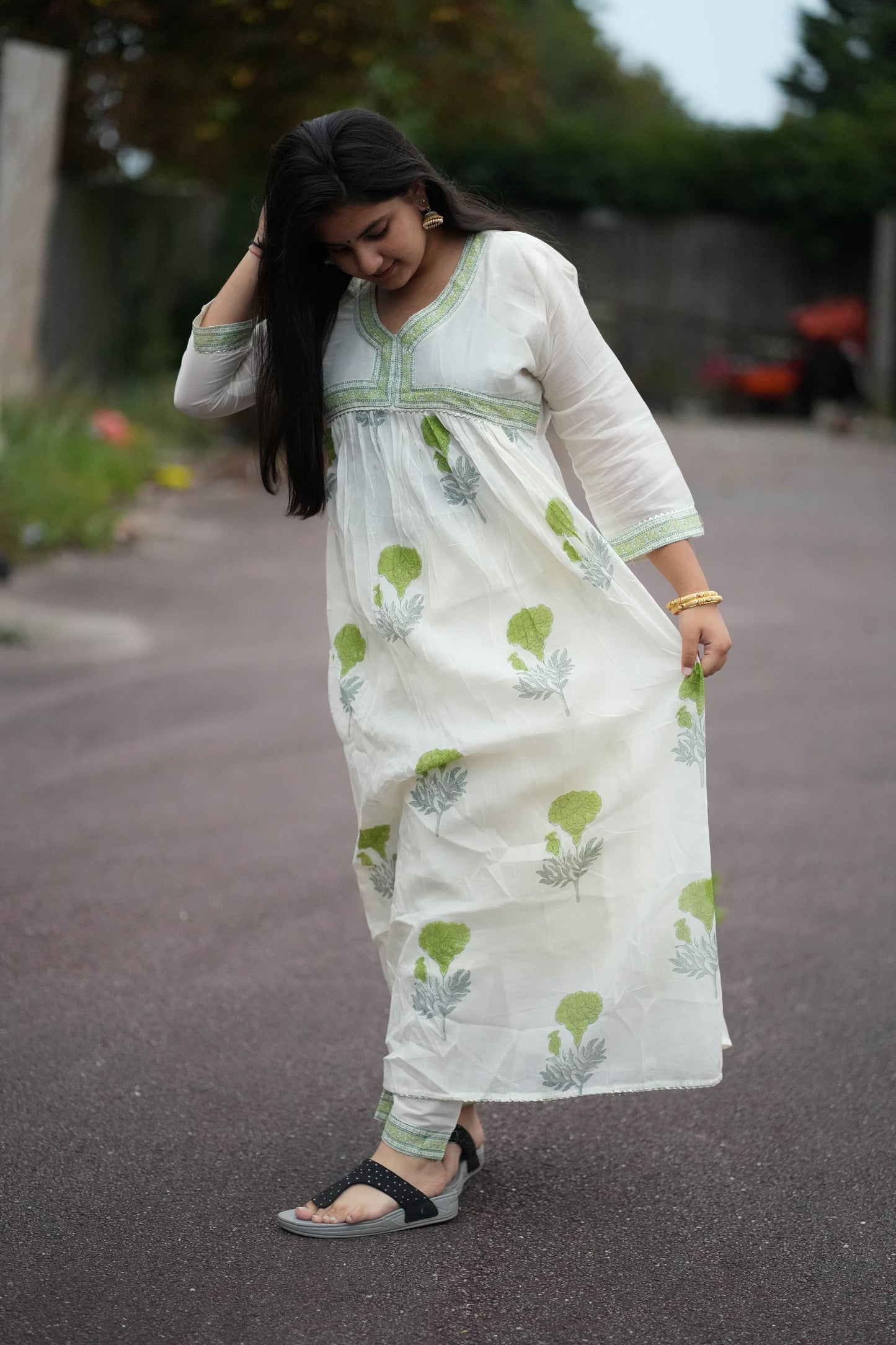 Alia cut fashionable kurti set in green floral designs