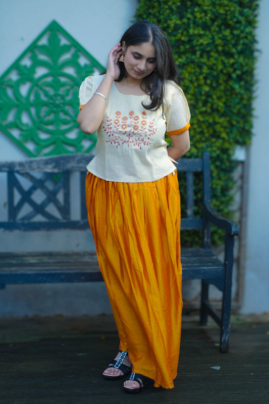 Handcrafted Beige Embroidered Cotton Top with Mustard Flowy Skirt – Ethnic Fusion Wear(KER-1168)