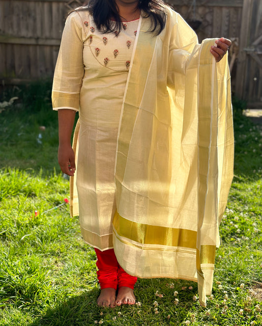 Golden tissue kasavu Churidhar in cream and red colour - 123